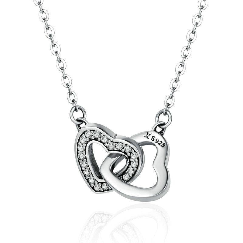 Collar de pareja de corazones conectados en plata de ley 925